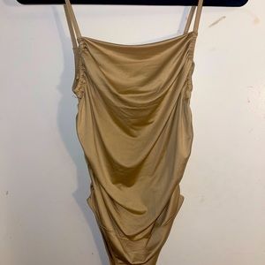 Medium Gold ‘And Now This..’ Bodysuit
